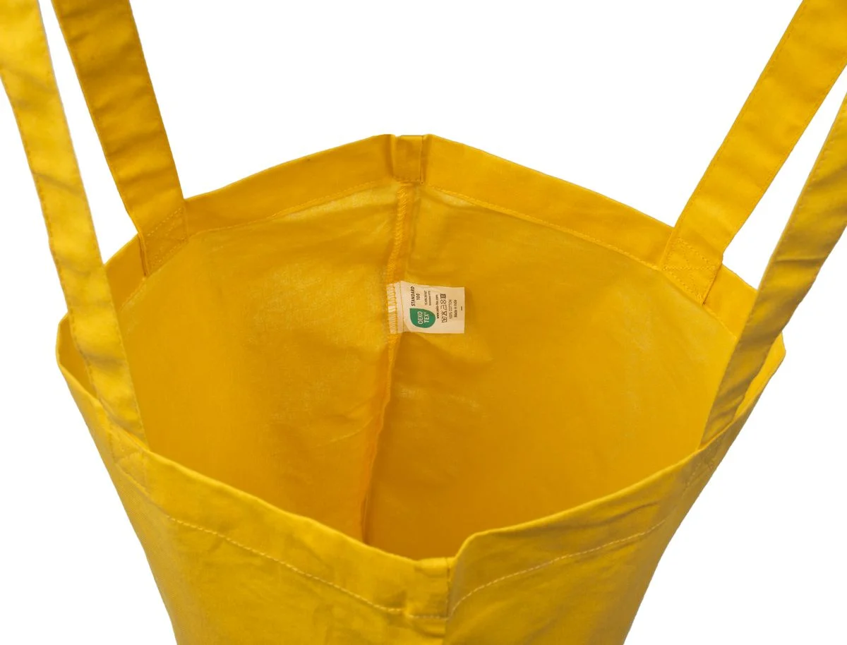 Bomullsnett, 140 g/m², innside med etikett – gult