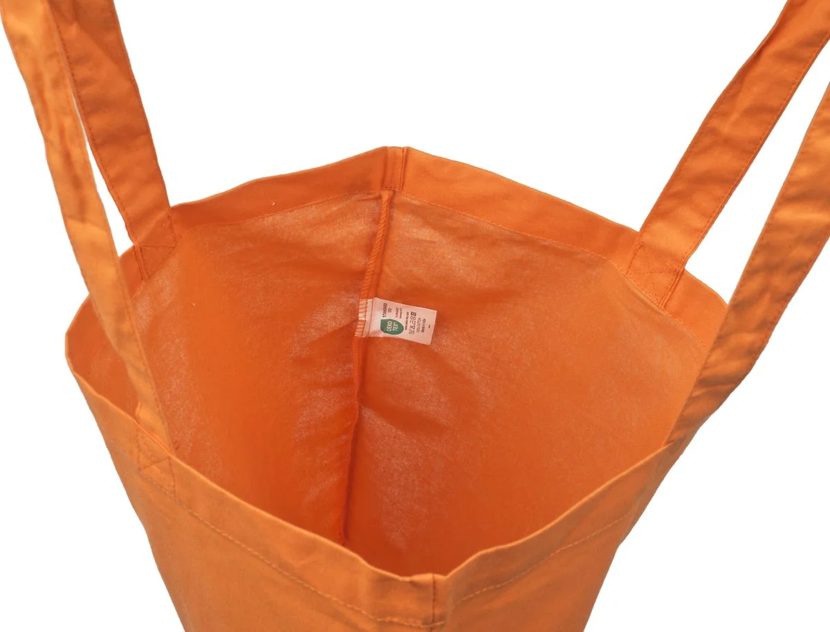 Bomullsnett, 140 g/m², innside med etikett – oransje